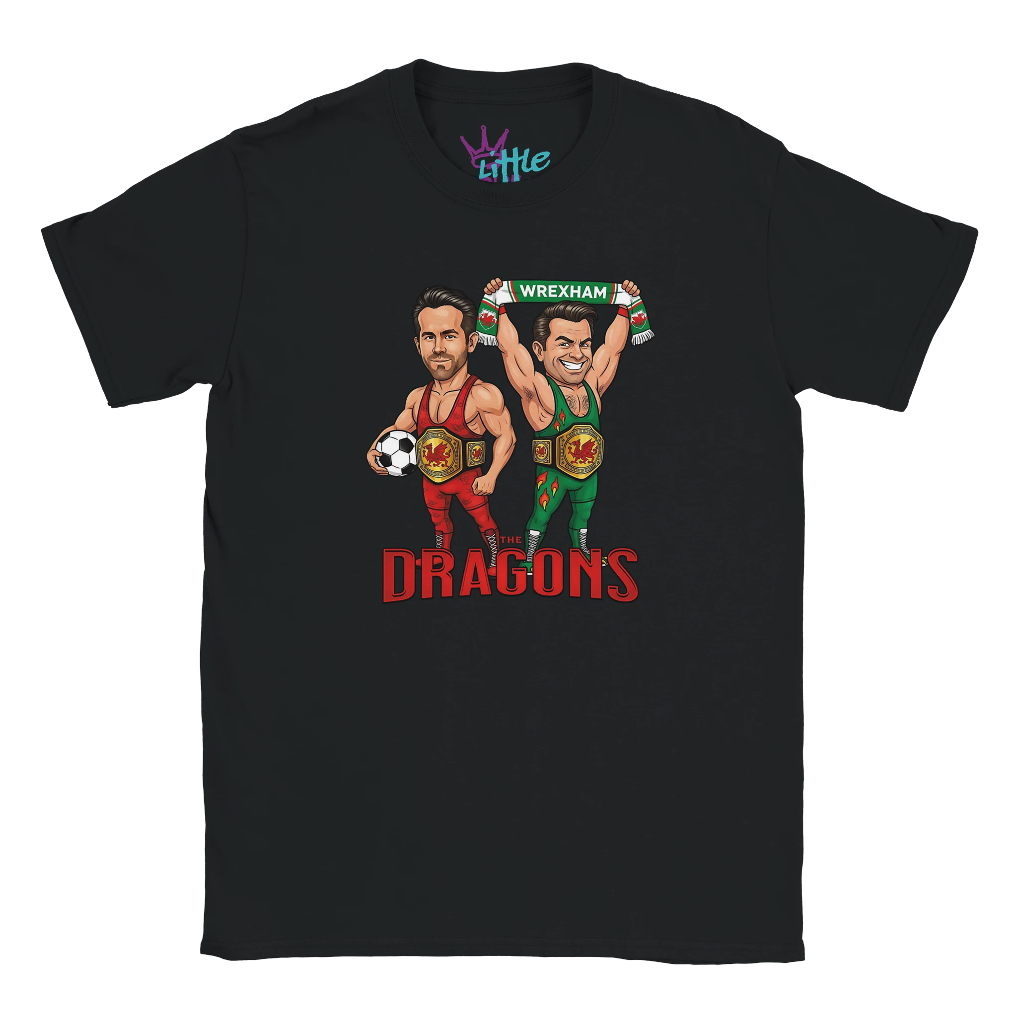 The Dragons x Champions Kids T-Shirt by Little Cult features cartoon Ryan Reynolds and another man in wrestling outfits with dragon emblems, one holding a soccer ball, the other with a Wrexham scarf, plus official Wrexham AFC branding.