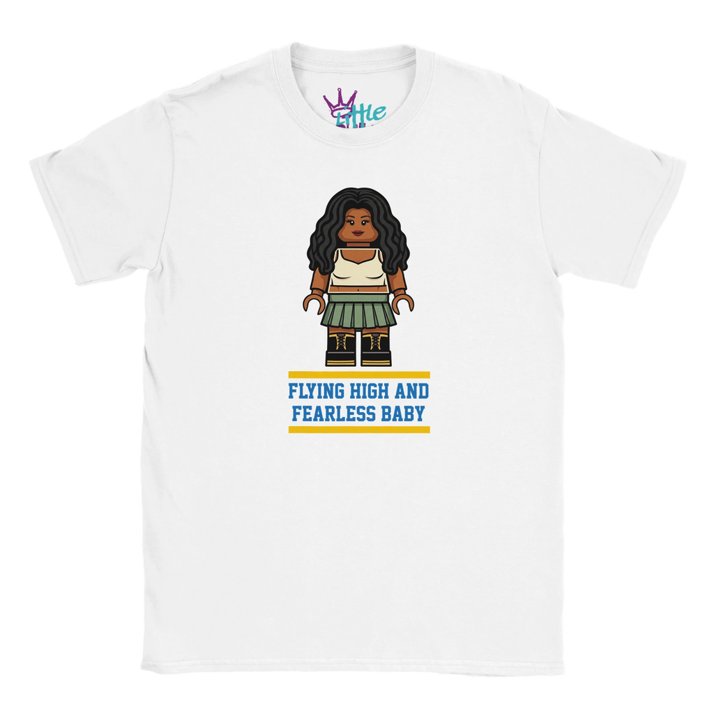 The Little Cult Brick Ctrl Soul x Blocks Kids T-Shirt in white features block-style art of a cartoon figure with long dark hair, blue "FLYING HIGH AND FEARLESS BABY" text, and is part of the Little Cult Blocks Collection.